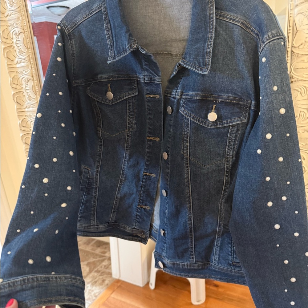 Women’s denim jacket with pearl details on both sleeves.  Size XL.  Like new!